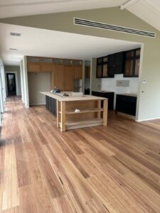 Feature grade blackbutt timber flooring in a family home in Botanic Ridge