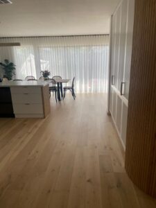 European Oak Engineered Timber Flooring Installed through a kitchen, dining and living area