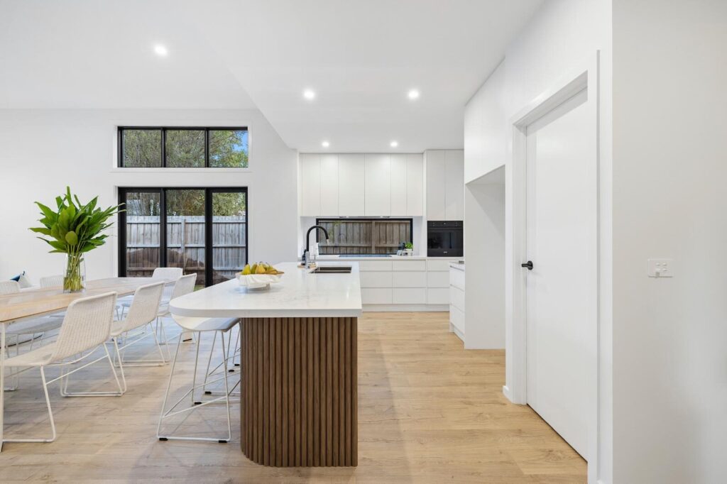 Quickstep Laminate flooring around a kitchen island in a renovated Melbourne home