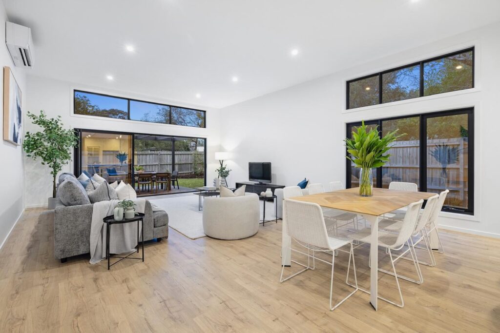 Laminate flooring in a bright open plan living and dining room - Mornington Peninsula