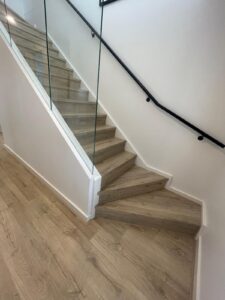 Water proof laminate staircase with custom made satirnosings - Frankston South